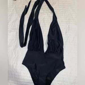 Black plunge neck, open back one piece swimsuit